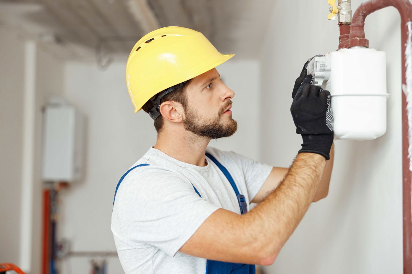 24-7 gas engineer checking a meter