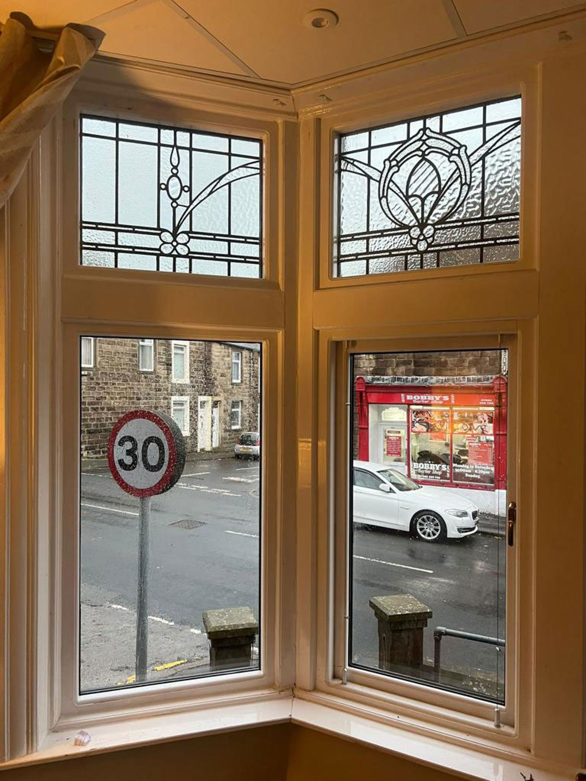 Refurbished stained glass bay window